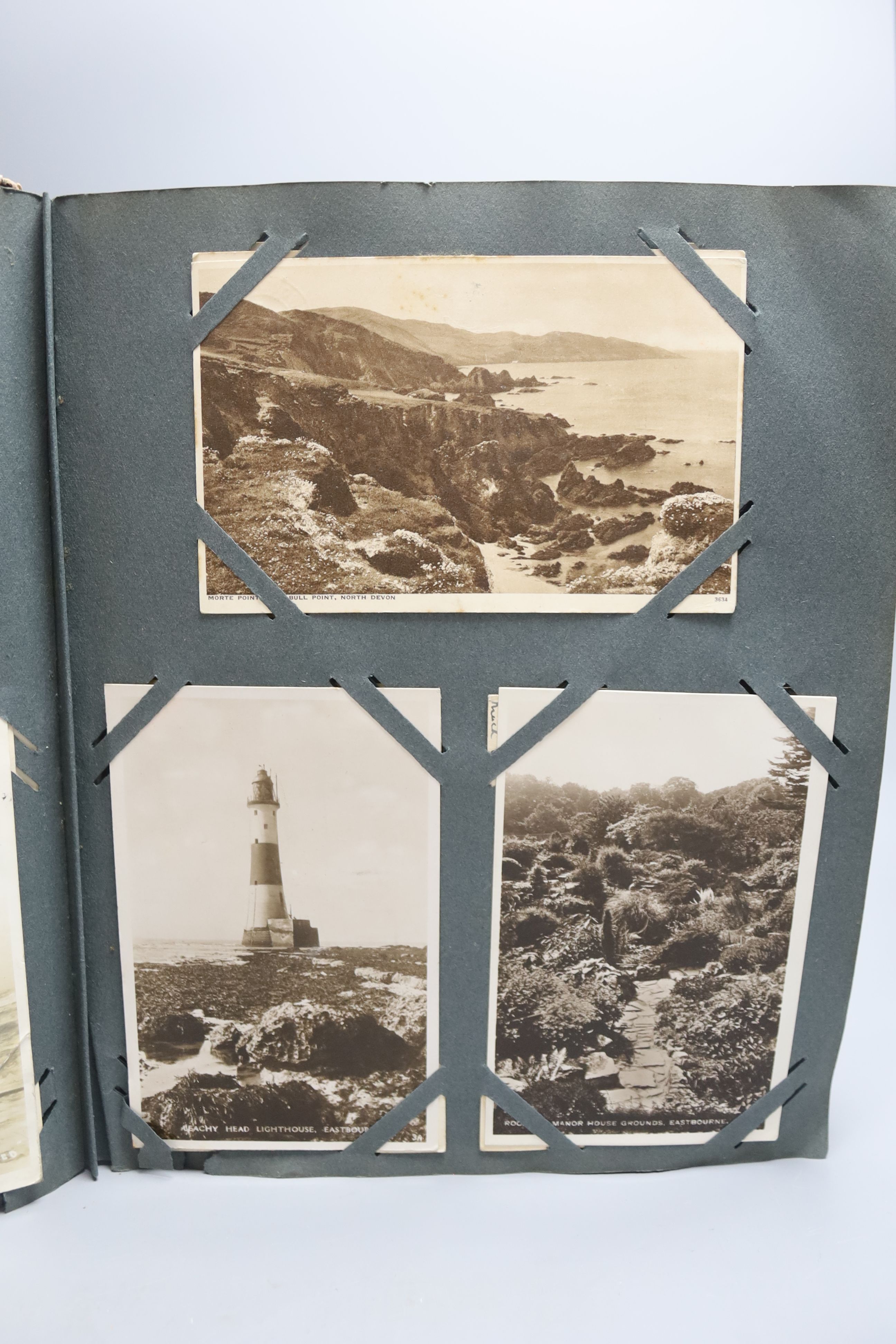 Two albums of Edwardian and later postcards, including Sussex, Kent, Surrey and seaside resort views